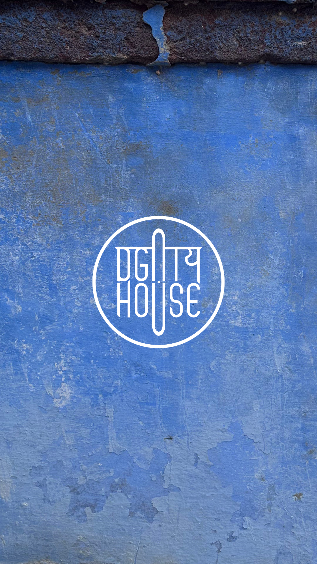 DGT House logo on a blue wall