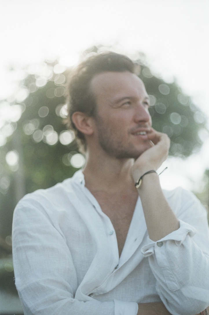 Victorien Mulliez in a white linen shirt, photographed outdoors